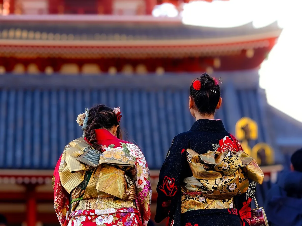 Two women in colourful kimono at Senso-ji temple in Asakusa