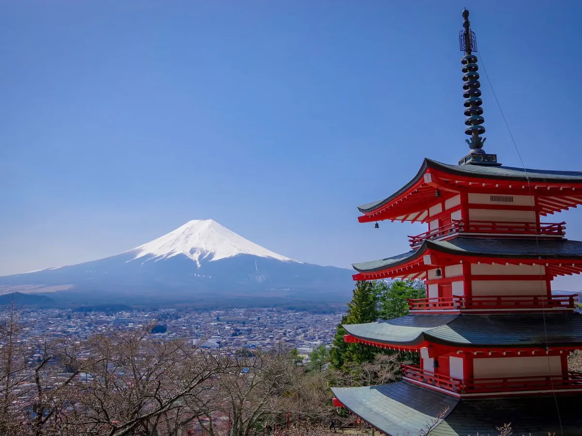 Mt Fuji behind the red Chureito Pagoda on a clear day